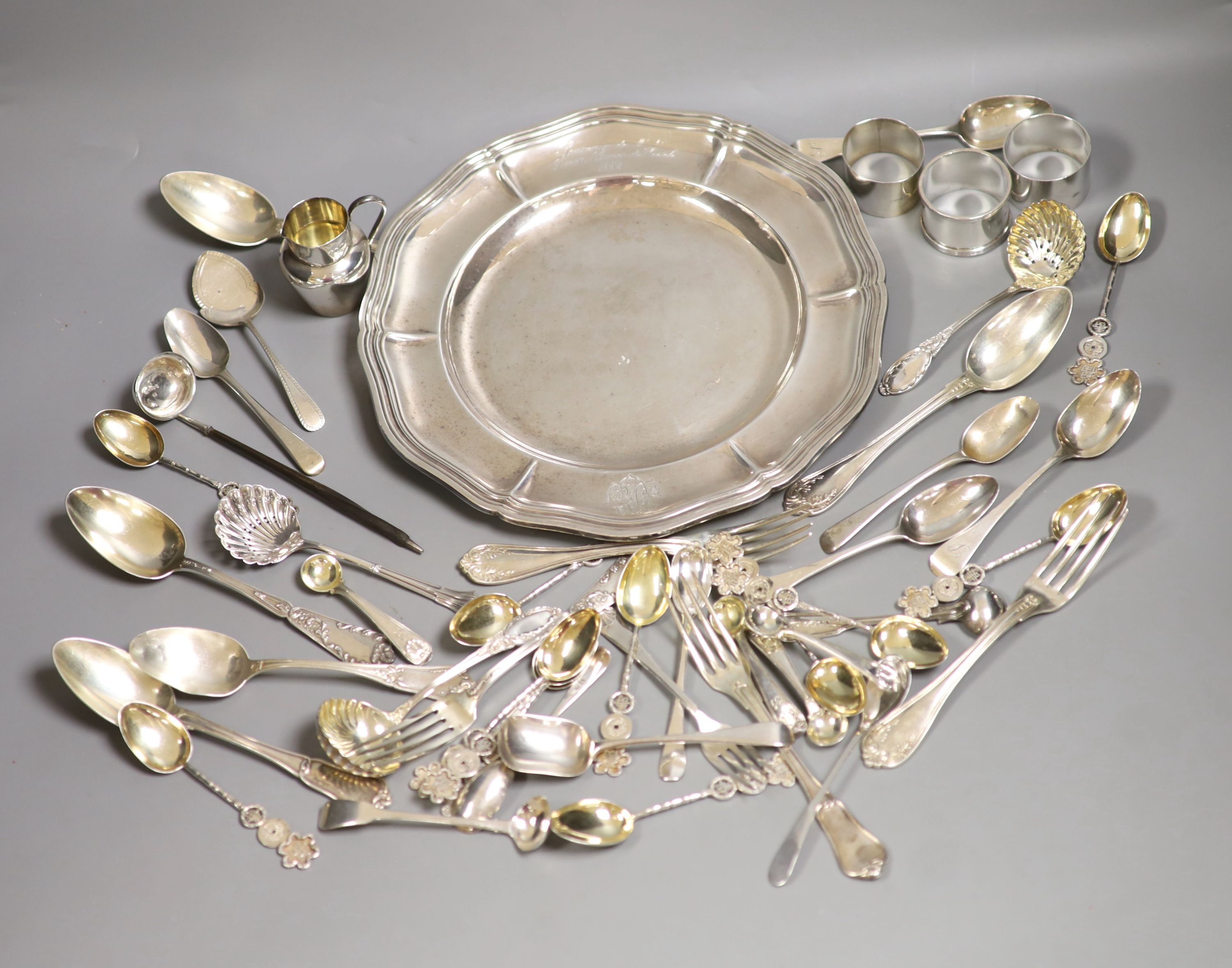 A group of assorted flatware, including some French and Chinese white metal and English silver and an Odiot 1885 white metal plate